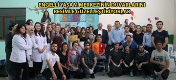 Engelli yaşam merkezinin duvarlarını resimle güzelleştiriyorlar
