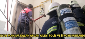 Evde mahsur kalan Afgan aileyi polis ve itfaiye kurtardı