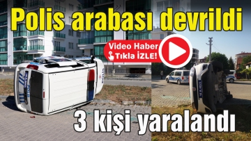 Polis arabası devrildi