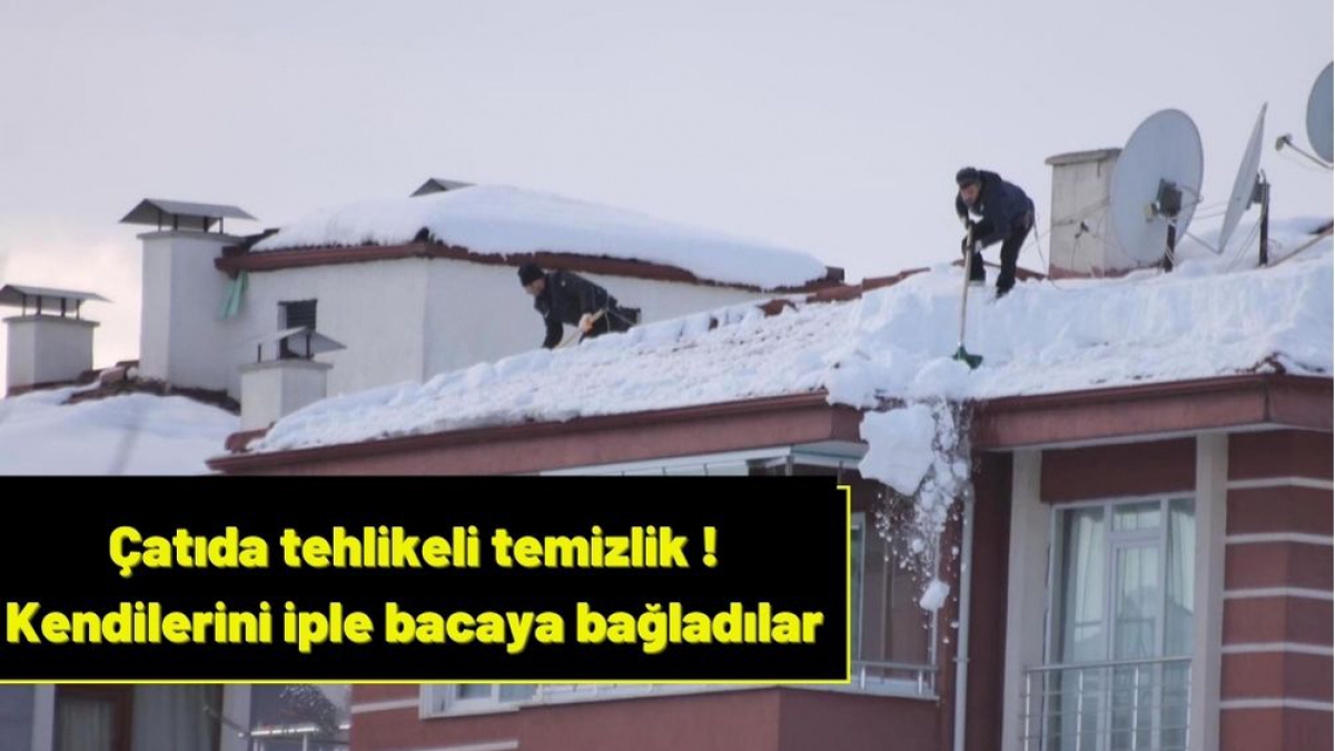 Kendilerini iple bacaya bağlayıp çatıdan kar kürüdüler
