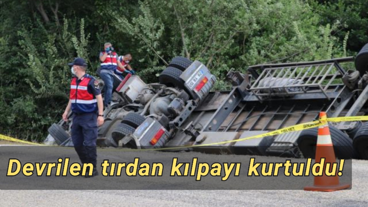 DEVRİLEN TIRDAN KILPAYI KURTULDU