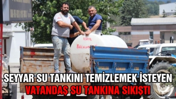 Su tankına sıkıştı