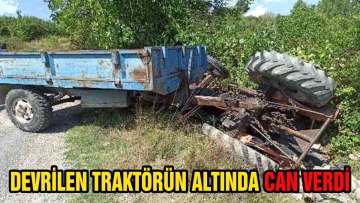 DEVRİLEN TRAKTÖRÜN ALTINDA CAN VERDİ