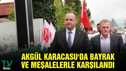 Akgül Karacasu'da bayrak ve meşalelerle karşılandı