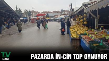 PAZARDA İN CİN TOP OYNUYOR