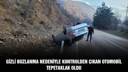 Gizli buzlanma nedeniyle kontrolden çıkan otomobil tepetaklak oldu