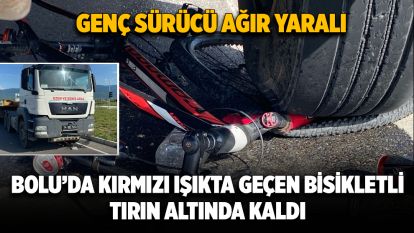 Bolu'da kırmızı ışıkta geçen bisikletli tırın altında kaldı: Genç sürücü ağır yaralı