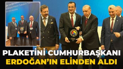 Plaketini Cumhurbaşkanı Erdoğan'ın elinden aldı