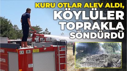 Kuru otlar alev aldı, köylüler toprakla söndürdü