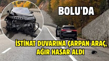 Bolu'da istinat duvarına çarpan araç, ağır hasar aldı