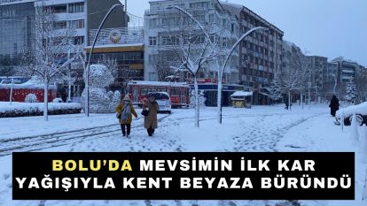 Bolu'da mevsimin ilk kar yağışıyla kent beyaza büründü