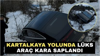 Kartalkaya yolunda lüks araç kara saplandı