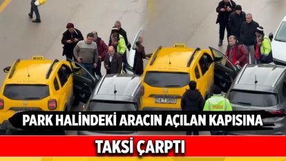 Park halindeki aracın açılan kapısına taksi çarptı