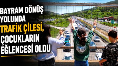 Bayram dönüş yolunda trafik çilesi, çocukların eğlencesi oldu
