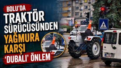 Bolu'da traktör sürücüsünden yağmura karşı 'dubalı' önlem